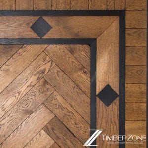 A Parquet Floor Designs with a black herringbone pattern